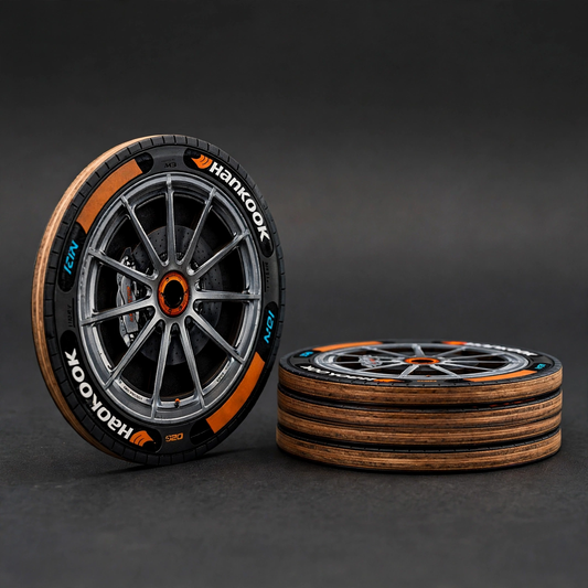 GripTrack™ Performance Wheel Coaster Set featuring realistic alloy wheel design
